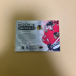 2019/20 Upper Deck Series 2 Kirby Dach Rookie Materials Jersey Chicago Blackhawks RM-KD Sports Card