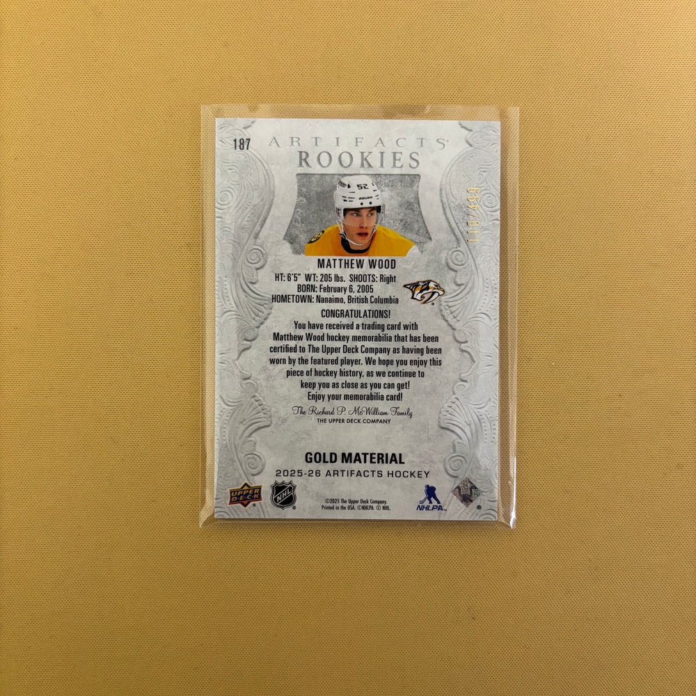 2025/26 Upper Deck Artifacts Matthew Wood Gold Material Rookie Jersey /499 Nashville Predators #187 Sports Card