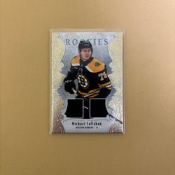 2025-26 Artifacts Bruins Michael Callahan Rookie Gold Material Dual Jersey /499 Sports Card