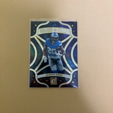 2025 Panini Donruss Football Galaxy Of Stars Jahmyr Gibbs #3 AT Sports Card